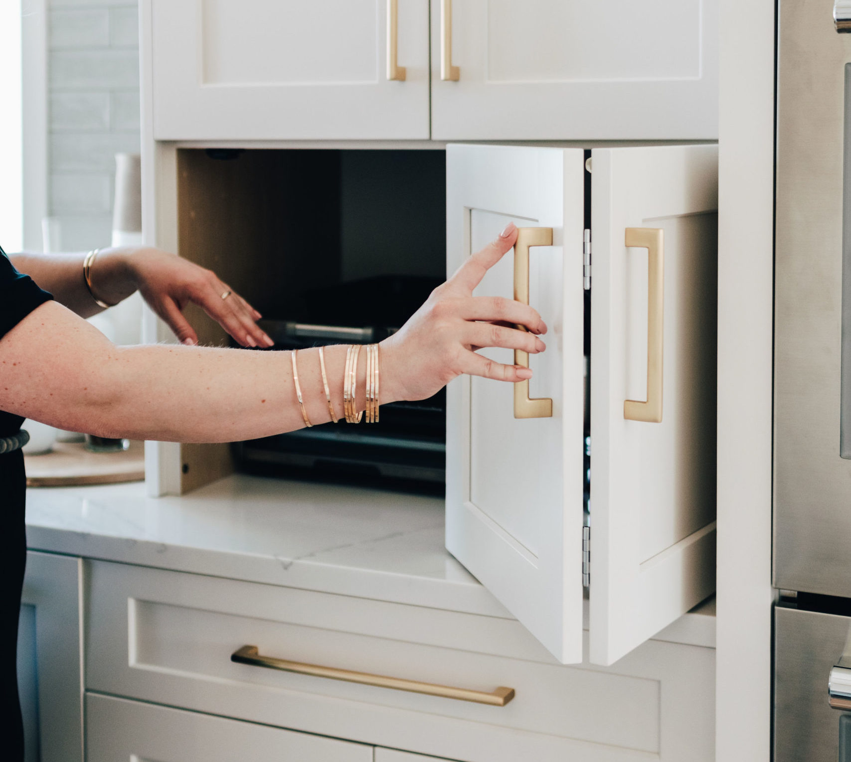 Appliance garages, pull-out shelves help organize kitchen