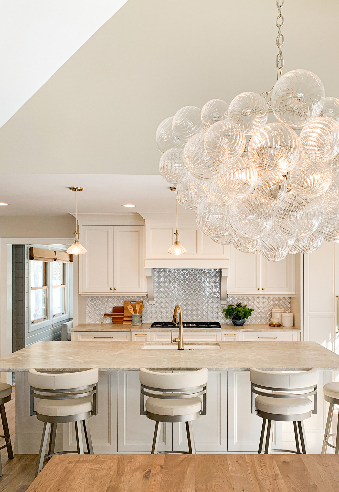 Warm, traditional kitchen with eclectic light fixtures