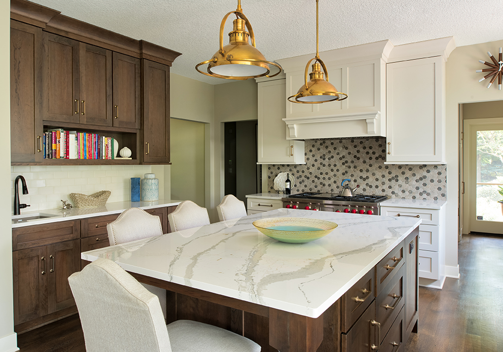 two-toned kitchen, wood and white cabinets, hexagon backsplash, brass nautical island pendant lights